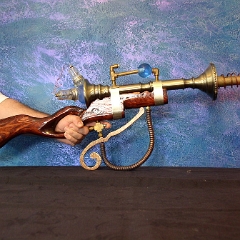 Steampunk_Ray_gun_by_Klaatahulin